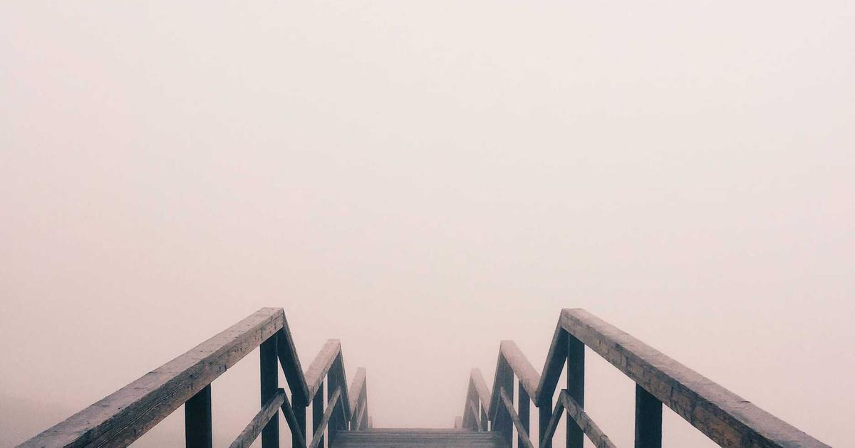 airport departure board showing cheap flight error fare deals